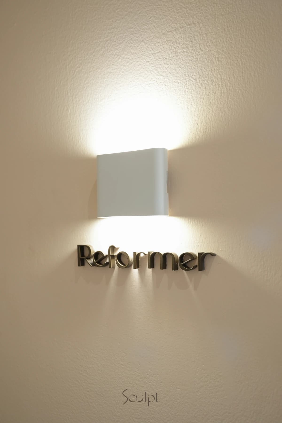 The Reformer room sign at Sculpt